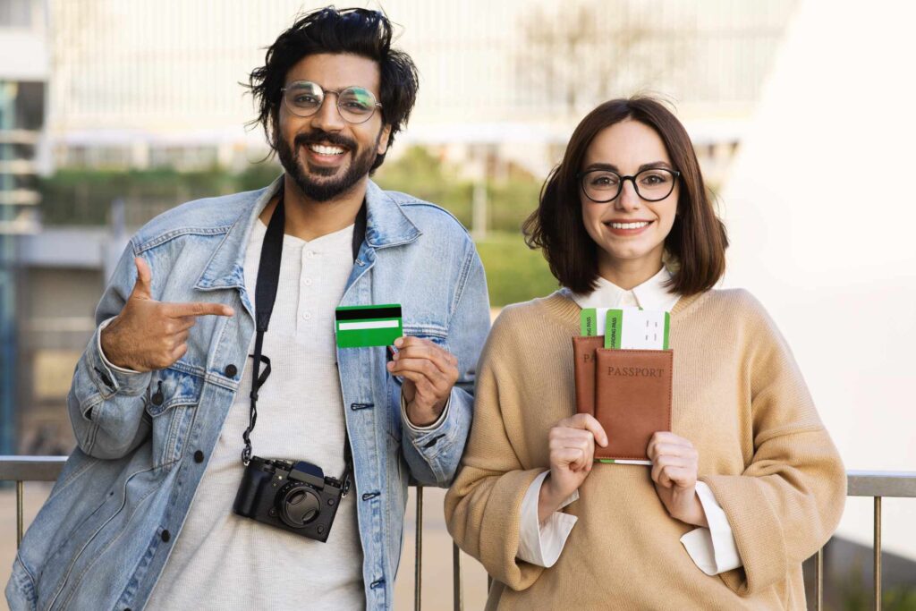 happy-smiling-young-diverse-man-and-woman-tourists-WWJZN87.jpg